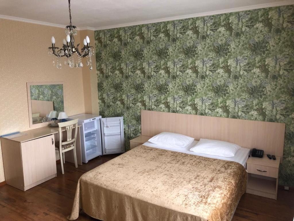 Двухместный (Улучшенный двухместный номер Делюкс с 1 кроватью или 2 отдельными кроватями) гостиницы Ливерпуль, Курганинск