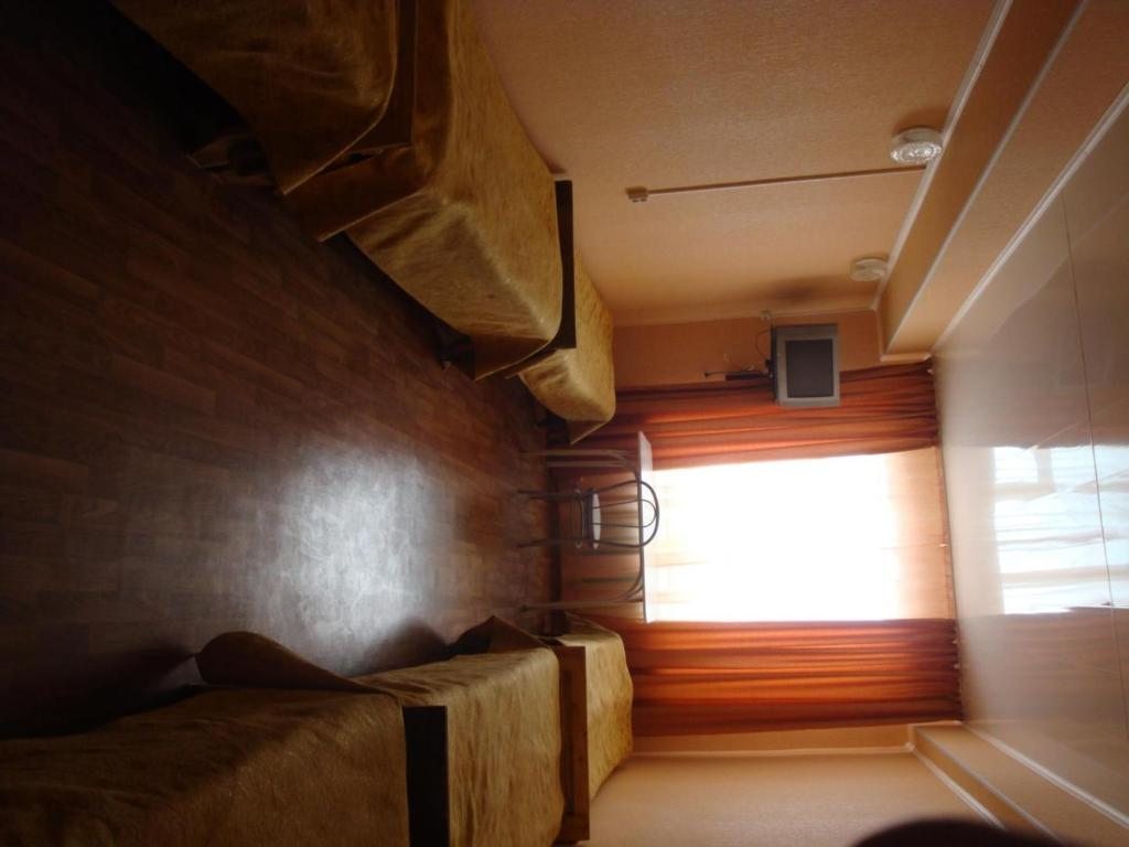 Номер (Кровать в общем 6-местном номере для мужчин) гостиницы Солнечная, Ишим