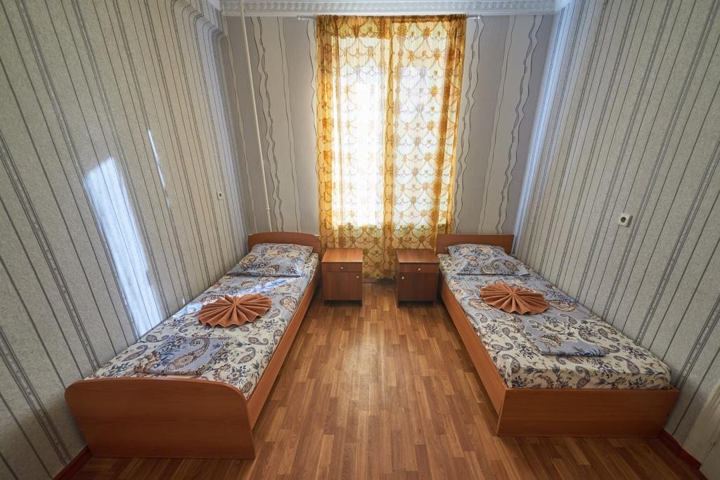 Номер (Односпальная кровать в общем номере с 2 кроватями) хостела Общежитие на Ленина 18, Магнитогорск