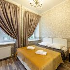 Две односпальные кровати или объединённые в двуспальную