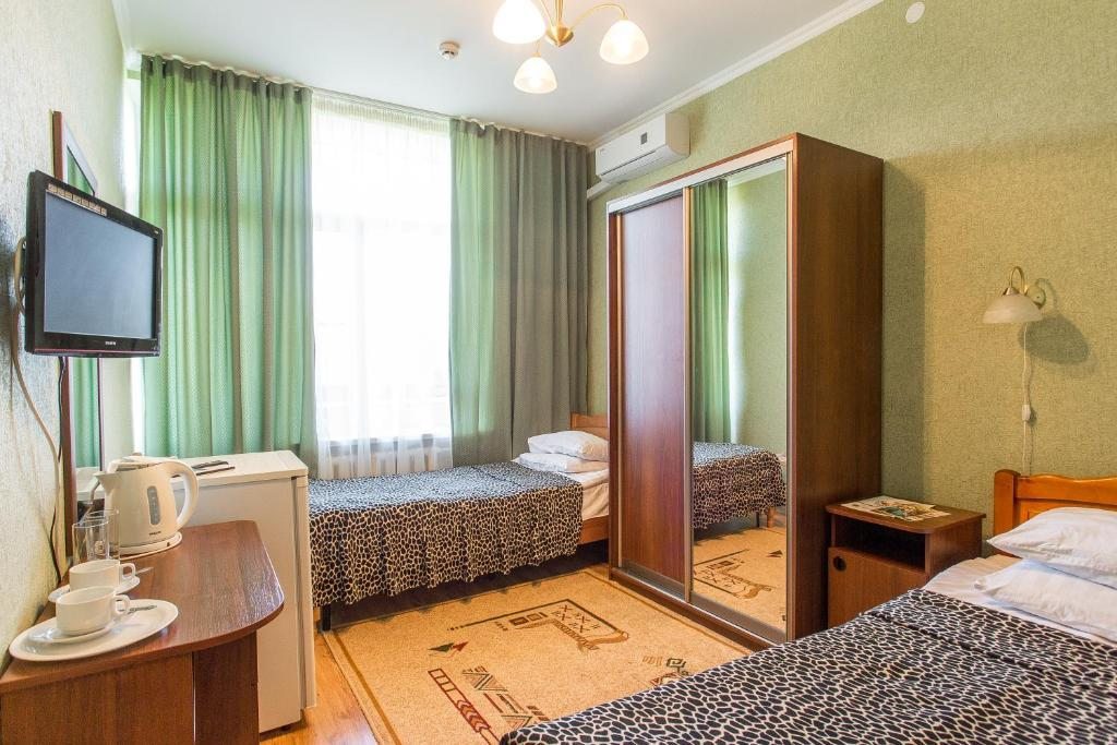 Номер (Односпальная кровать в общем номере) отеля Ленина, Ульяновск