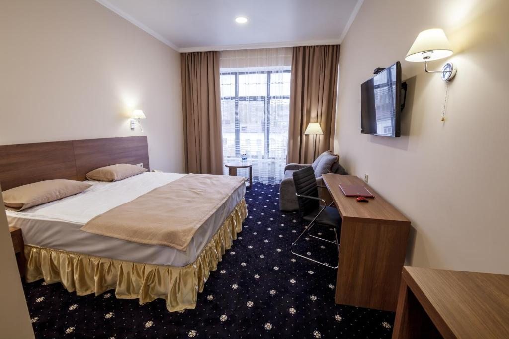 Двухместный (Двухместный номер Делюкс с 1 кроватью или 2 отдельными кроватями) отеля Центральный город Махачкала