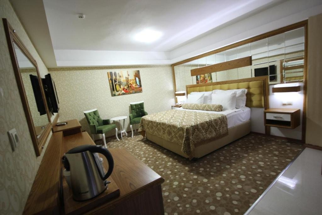Двухместный (Двухместный номер с 1 кроватью или 2 отдельными кроватями) отеля Grand Corner, Измир