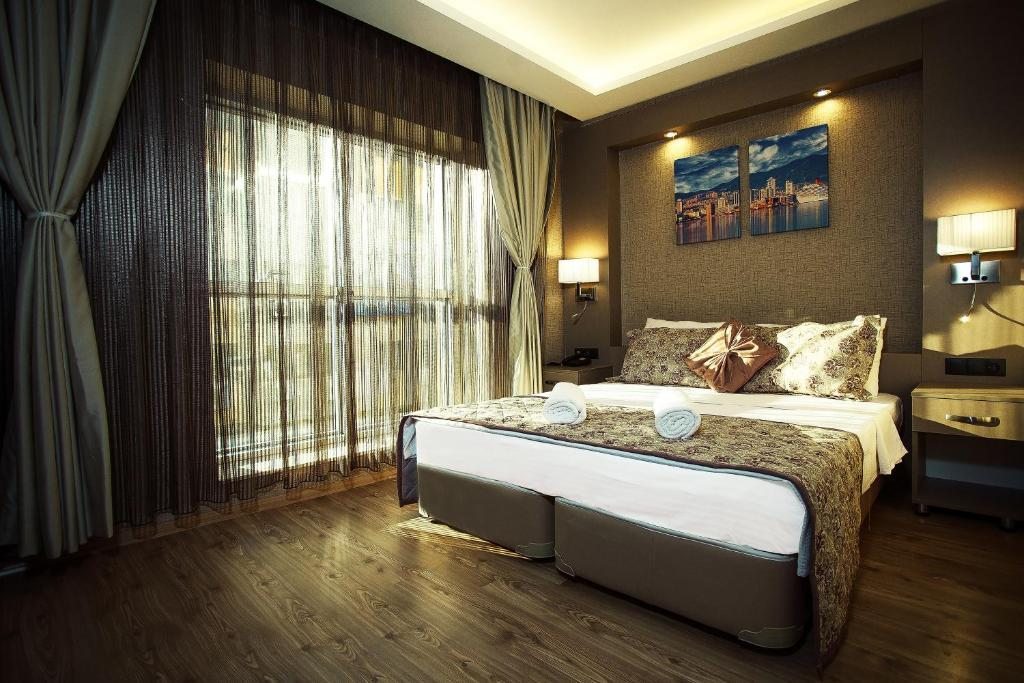 Двухместный (Двухместный номер с 1 кроватью или 2 отдельными кроватями) отеля Hotel Iz, Измир