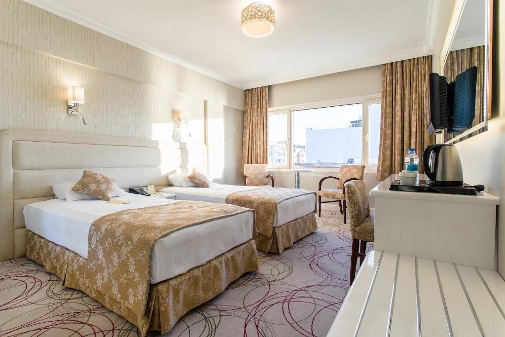 Двухместный (Стандартный двухместный номер с 1 кроватью или 2 отдельными кроватями) отеля Kilim Hotel Izmir, Измир