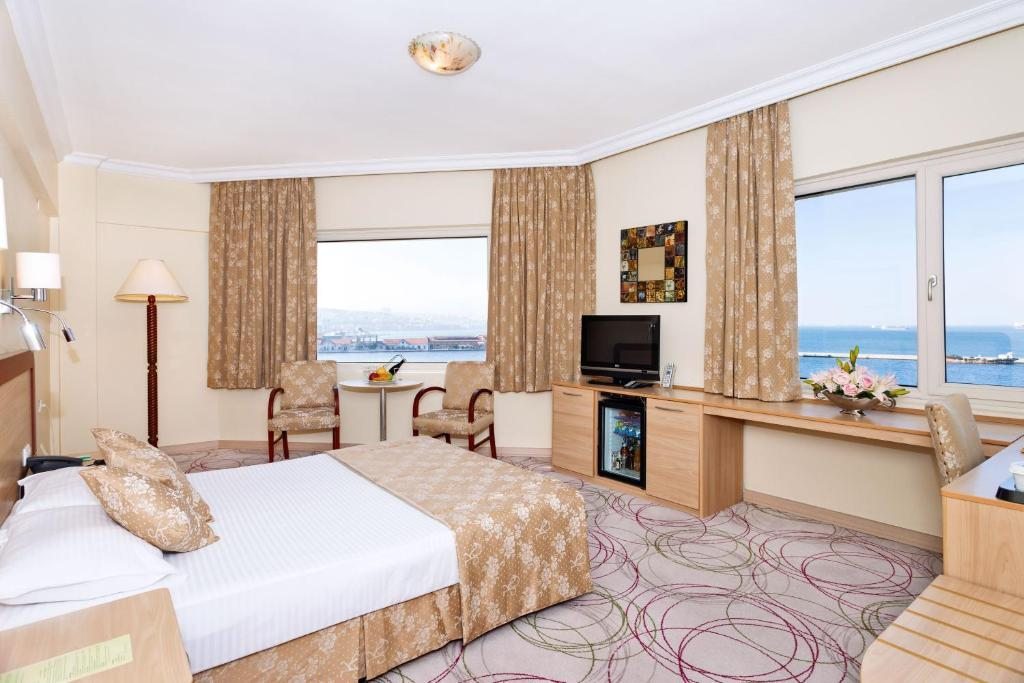Двухместный (Двухместный номер Делюкс с 1 кроватью или 2 отдельными кроватями) отеля Kilim Hotel Izmir, Измир