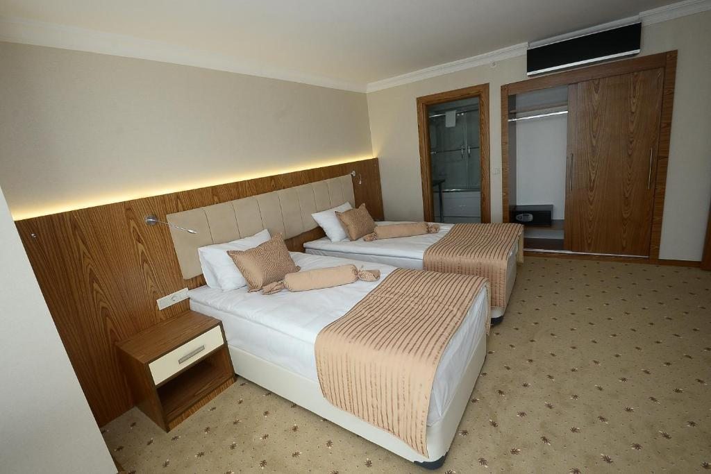 Двухместный (Стандартный двухместный номер с 2 отдельными кроватями) отеля NK Hotel, Измир