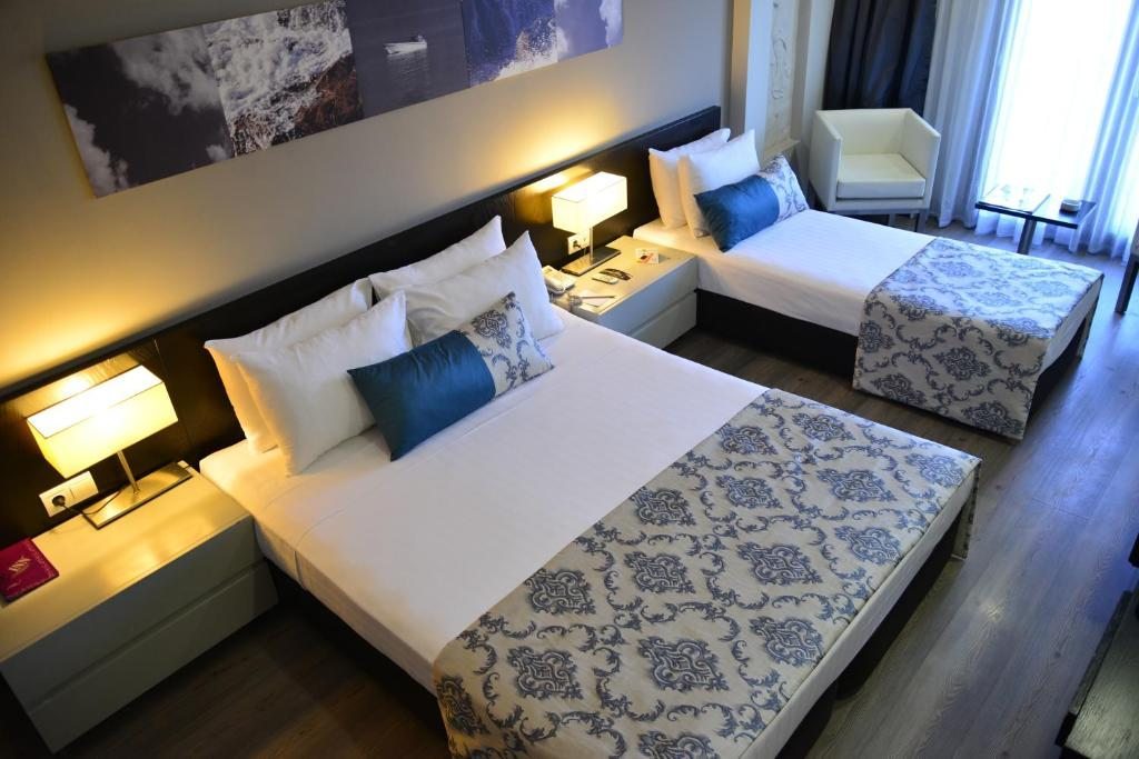 Двухместный (Двухместный номер Делюкс с 1 кроватью или 2 отдельными кроватями) отеля SC Inn, Измир