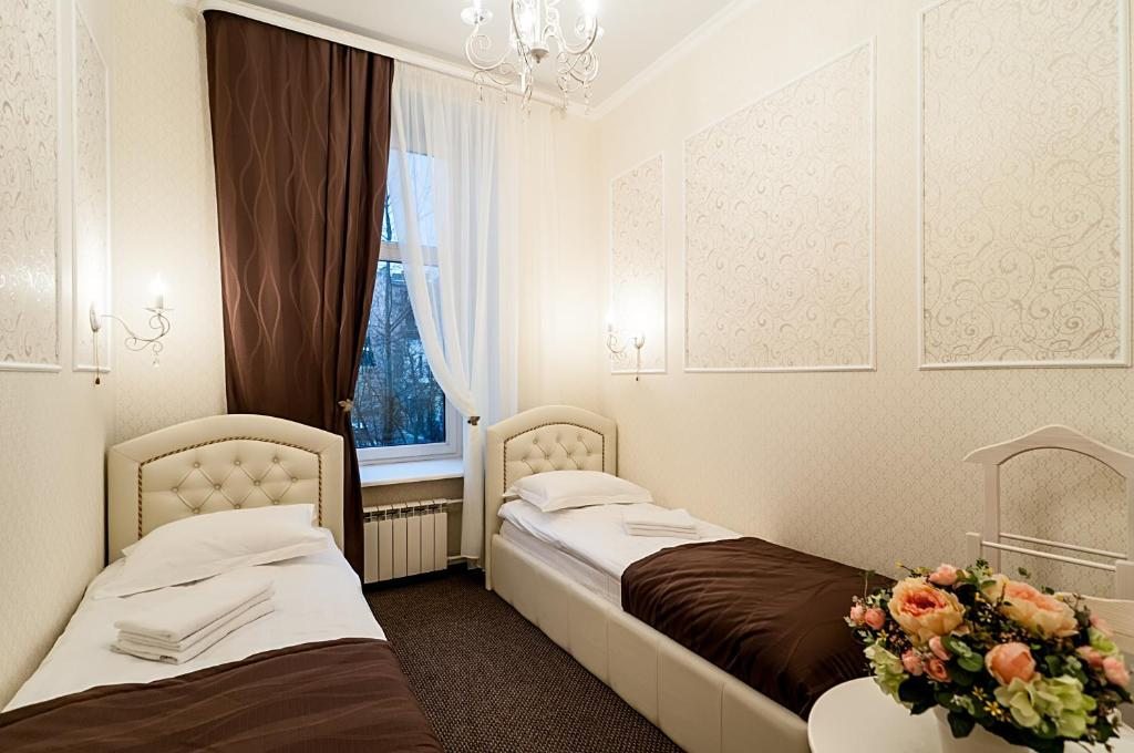 Двухместный (Двухместный номер с 2 отдельными кроватями и ванной комнатой) гостевого дома Блюз на Профессора Ивашенцова, Санкт-Петербург