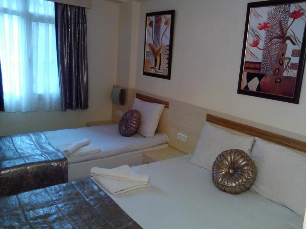 Двухместный (Двухместный номер эконом-класса с 1 кроватью или 2 отдельными кроватями) отеля Olimpiyat Izmir, Измир