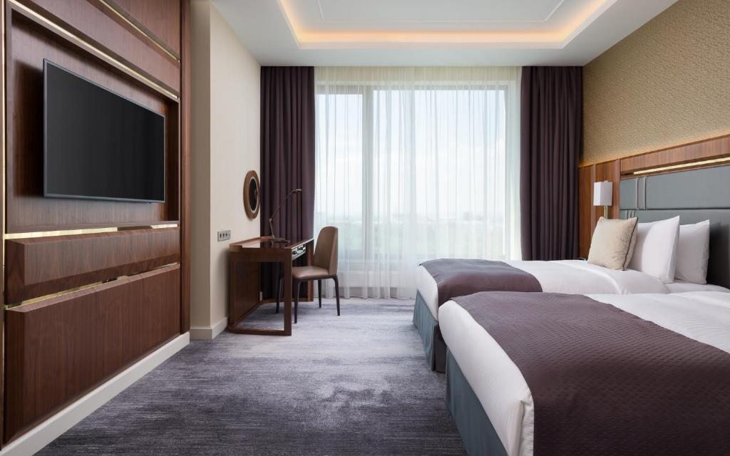 Двухместный (Улучшенный двухместный номер с 2 отдельными кроватями) отеля Lotte Hotel Samara, Самара