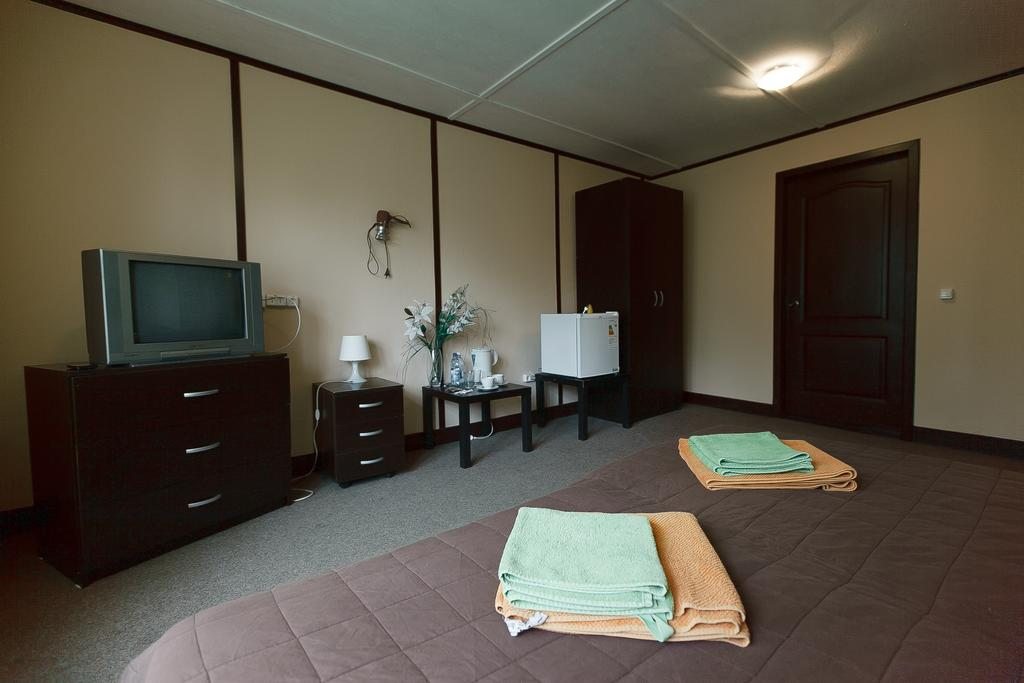 Двухместный (Двухместный номер с 1 кроватью или 2 отдельными кроватями) отеля Green Apple, Небуг