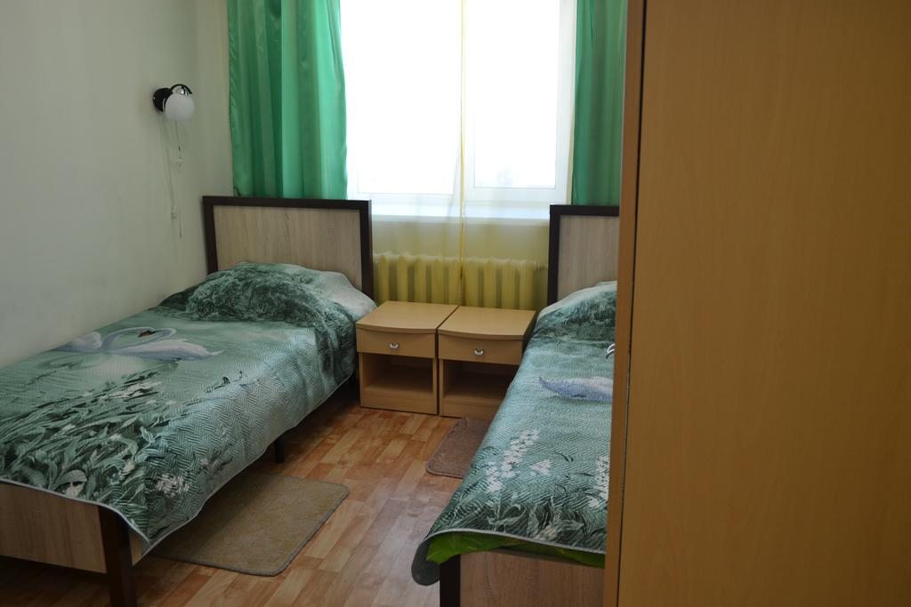 Двухместный (Бюджетный двухместный номер с 2 отдельными кроватями) отеля Учебная 11, Томск