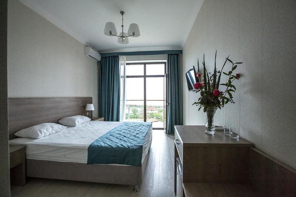 Двухместный (Двухместный номер Делюкс с 1 кроватью или 2 отдельными кроватями и видом на море) отеля Каспий, Манас