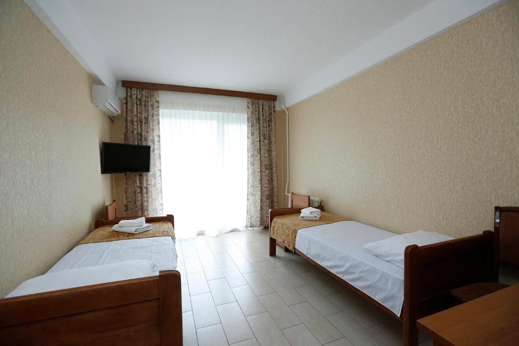 Двухместный (Бюджетный двухместный номер с 1 кроватью или 2 отдельными кроватями) отеля Каспий, Манас