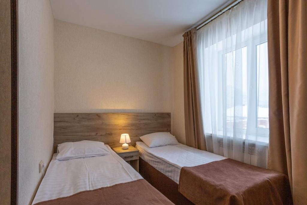 Двухместный (Стандартный двухместный номер с 1 кроватью или 2 отдельными кроватями) отеля Олимпик, Архыз