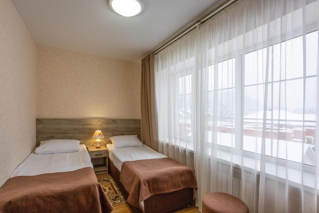 Двухместный (Стандартный двухместный номер плюс с 1 кроватью или 2 отдельными кроватями) отеля Олимпик, Архыз