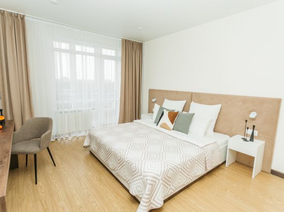 Фотография номера апарт отеля Первый