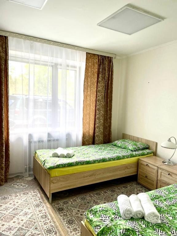 Двухместный (Двухместный номер с 2 отдельными кроватями) отеля Лесная на Холмогорской, Ноябрьск