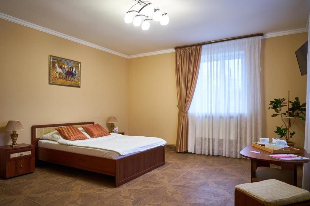 Двухместный (Большой двухместный номер с 1 кроватью) отеля На Горшковском, Томск