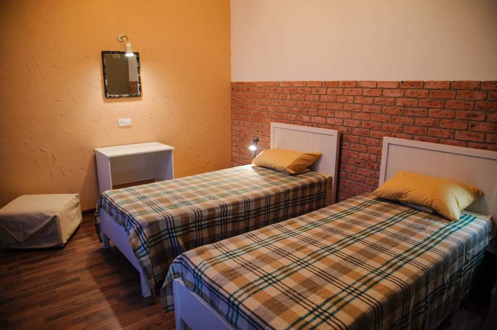 Двухместный (Бюджетный двухместный номер с 2 отдельными кроватями) хостела На Липецкой, Волгоград