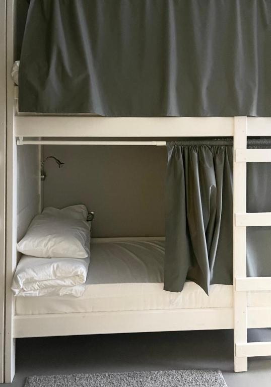 Номер (Спальное место на двухъярусной кровати в общем номере для женщин) гостиницы Таруса