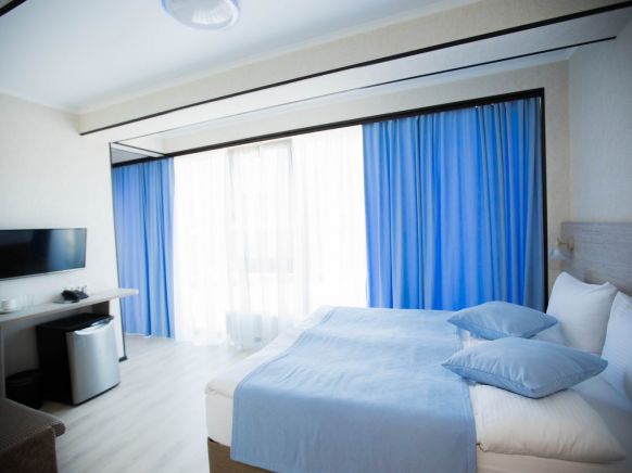 Фотография номера гостиницы Грейс Времена Года