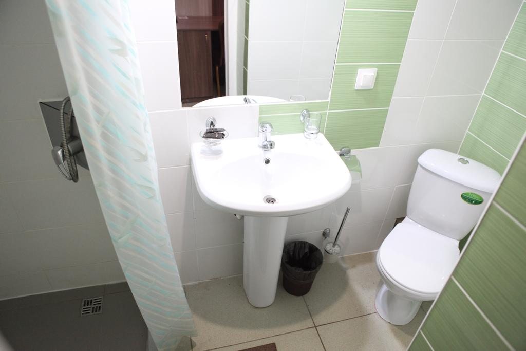 Трехместный (Трехместный номер с ванной комнатой) мини-отеля Ринг, Волгоград