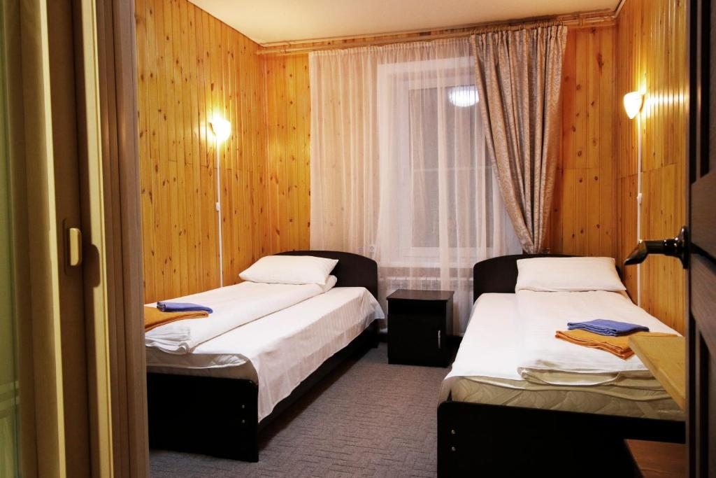 Двухместный (Двухместный номер с 2 отдельными кроватями и видом на озеро) отеля Star of Baikal, Хужир