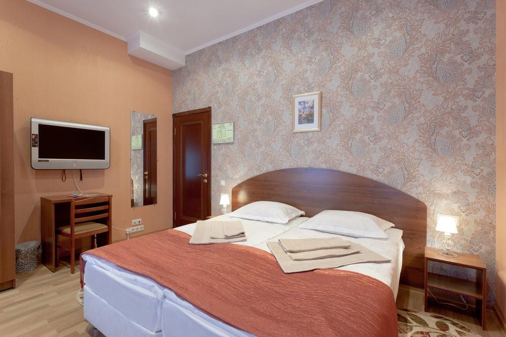 Двухместный (Двухместный номер с 1 кроватью или 2 отдельными кроватями и общей ванной комнатой) отеля Путиловъ 2, Санкт-Петербург