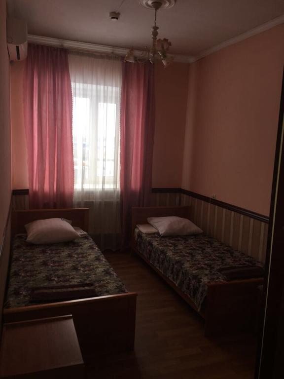Двухместный (Бюджетный двухместный номер с 2 отдельными кроватями) мотеля Балтика, Вышний Волочек