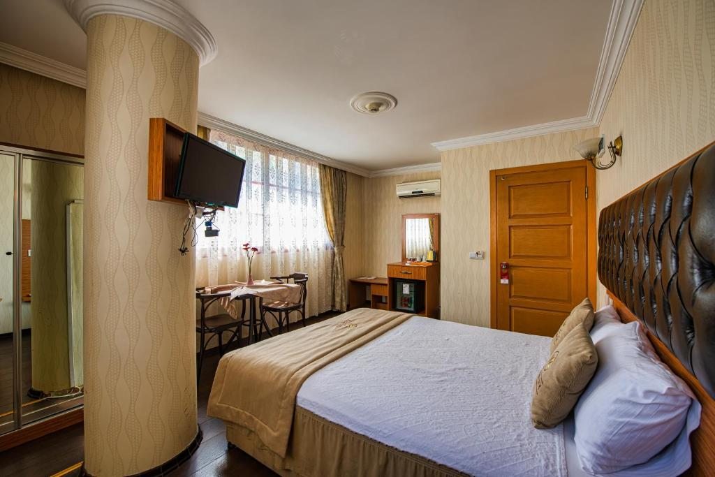 Двухместный (Двухместный номер с 1 кроватью или 2 отдельными кроватями) отеля Oglakcioglu Park City Hotel, Измир