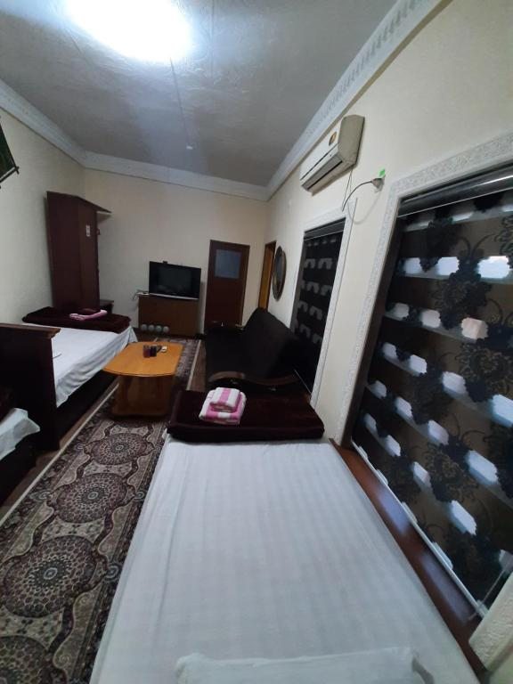Трехместный (Трехместный номер) отеля Nasriddin Navruz, Бухара