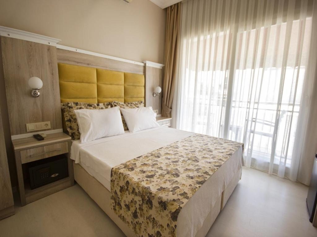 Двухместный (Двухместный номер Делюкс с 1 кроватью и видом на море) отеля Akkan Beach Hotel, Бодрум