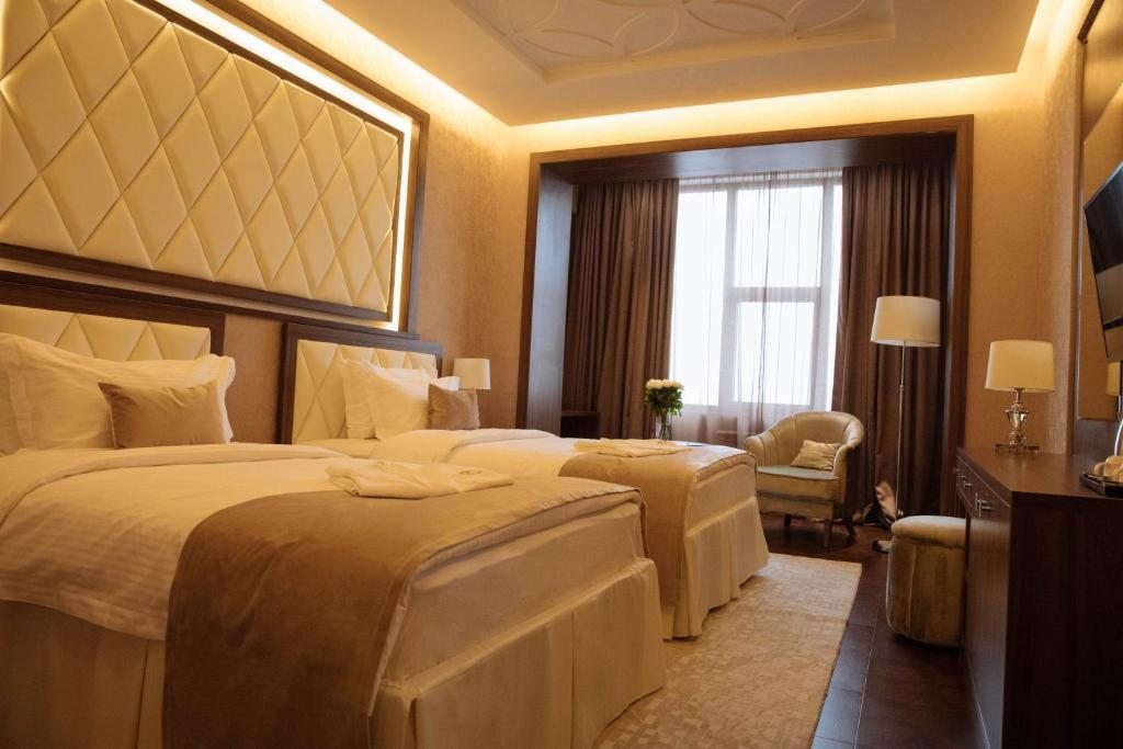 Двухместный (Двухместный номер Делюкс с 1 кроватью или 2 отдельными кроватями) отеля Garden Park Inn, Алматы
