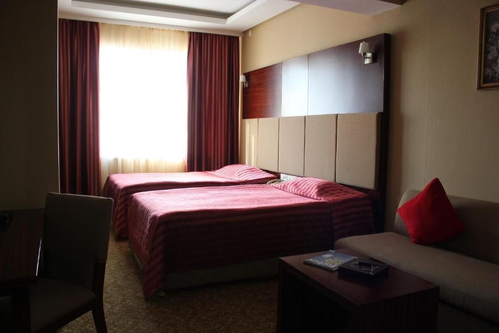 Двухместный (Стандартный двухместный номер с 1 большой кроватью или 2 отдельными кроватями) отеля Grand Aiser, Алматы