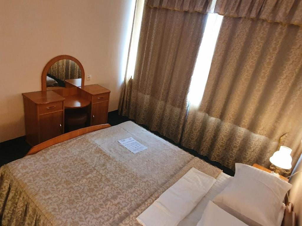 Двухместный (Улучшенный двухместный номер с 1 кроватью) отеля Актобе