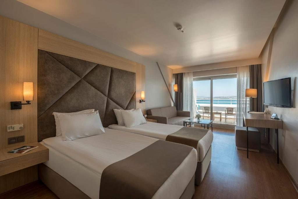 Двухместный (Двухместный номер Делюкс с 1 кроватью и видом на море) курортного отеля Altin Yunus, Чешме