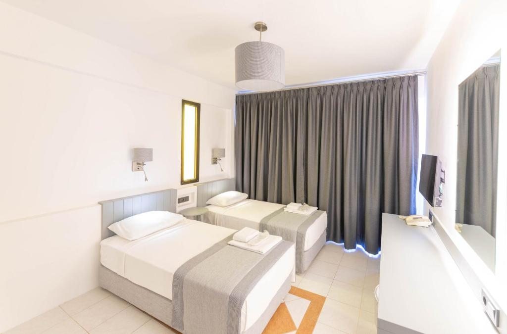 Двухместный (Двухместный номер с 1 кроватью или 2 отдельными кроватями и видом на море) отеля Arinnanda Hotel Cesme, Чешме