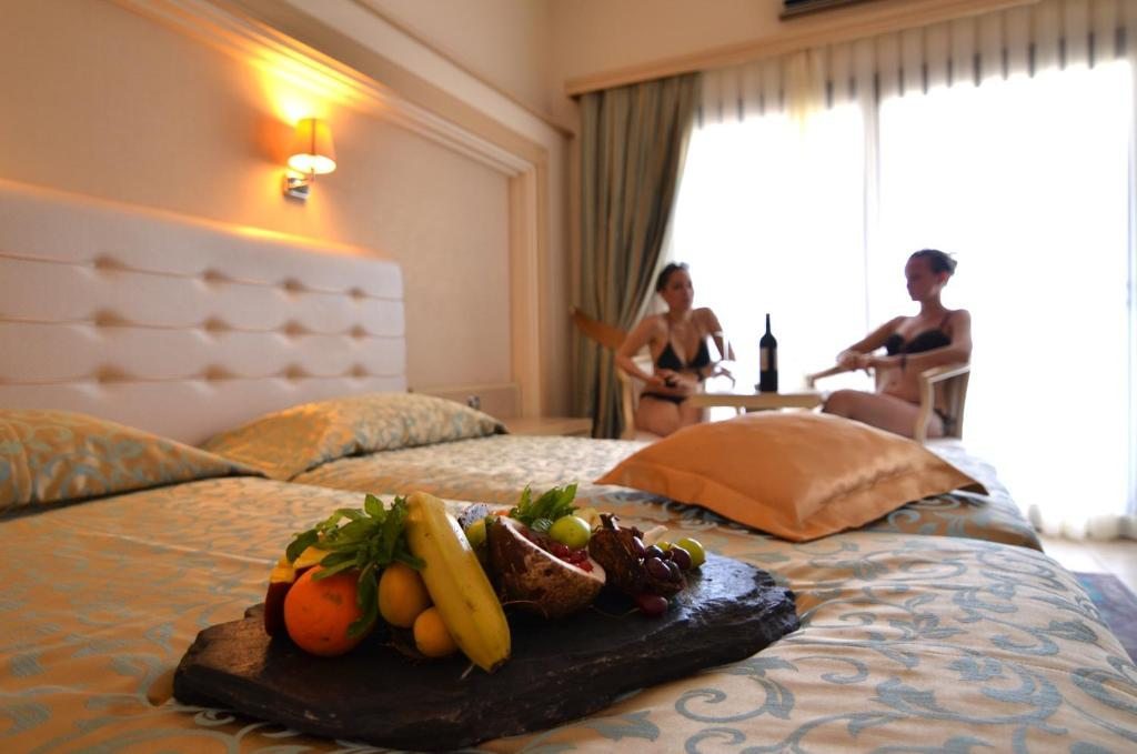 Двухместный (Стандартный двухместный номер с 1 кроватью или 2 отдельными кроватями, вид на море) курортного отеля Azka, Бодрум