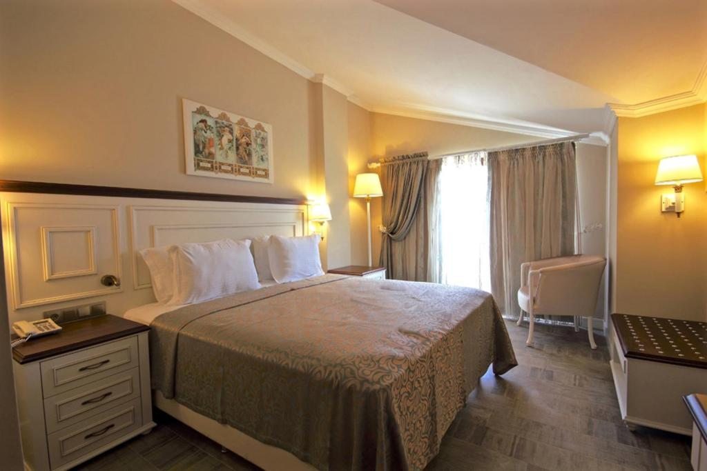 Двухместный (Улучшенный двухместный номер с 1 кроватью и французским балконом) курортного комплекса Dalyan Resort & Spa, Дальян