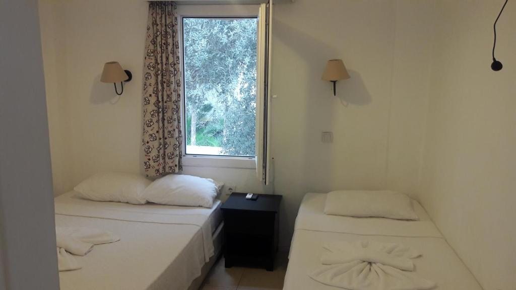 Двухместный (Двухместный номер с 1 кроватью или 2 отдельными кроватями) отеля Bircan Hotel, Бодрум