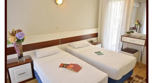 Двухместный (Стандартный двухместный номер с 2 отдельными кроватями) отеля Calis, Чешме
