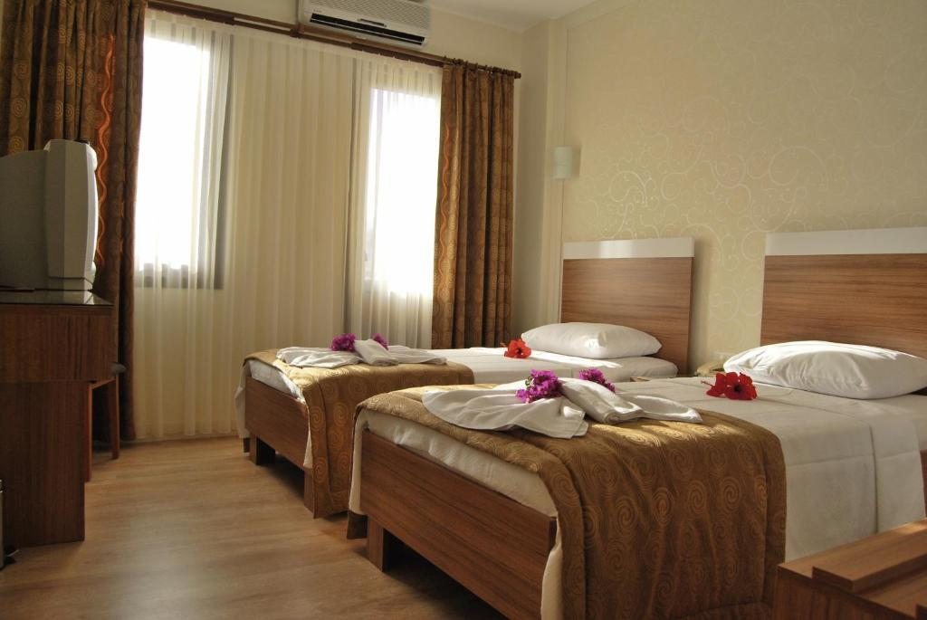 Двухместный (Двухместный номер с 1 кроватью или 2 отдельными кроватями) отеля Binlik, Дальян