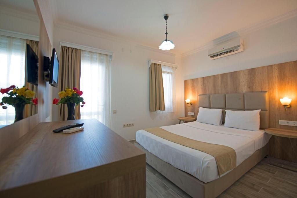 Двухместный (Стандартный двухместный номер с 1 кроватью или 2 отдельными кроватями) отеля Costa Maya Bodrum, Бодрум