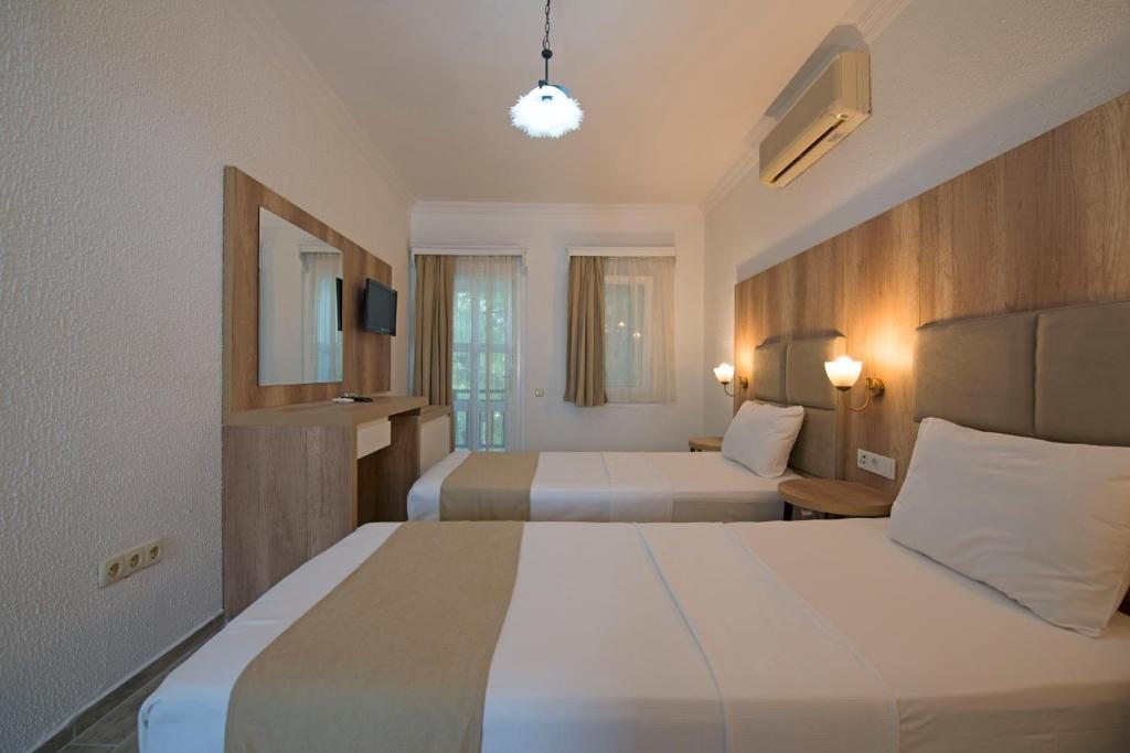 Апартаменты (Стандартный четырехместный номер) отеля Costa Maya Bodrum, Бодрум