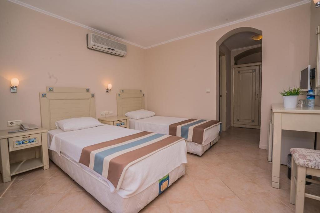 Двухместный (Стандартный двухместный номер с 2 отдельными кроватями) отеля Sariyaz, Бодрум