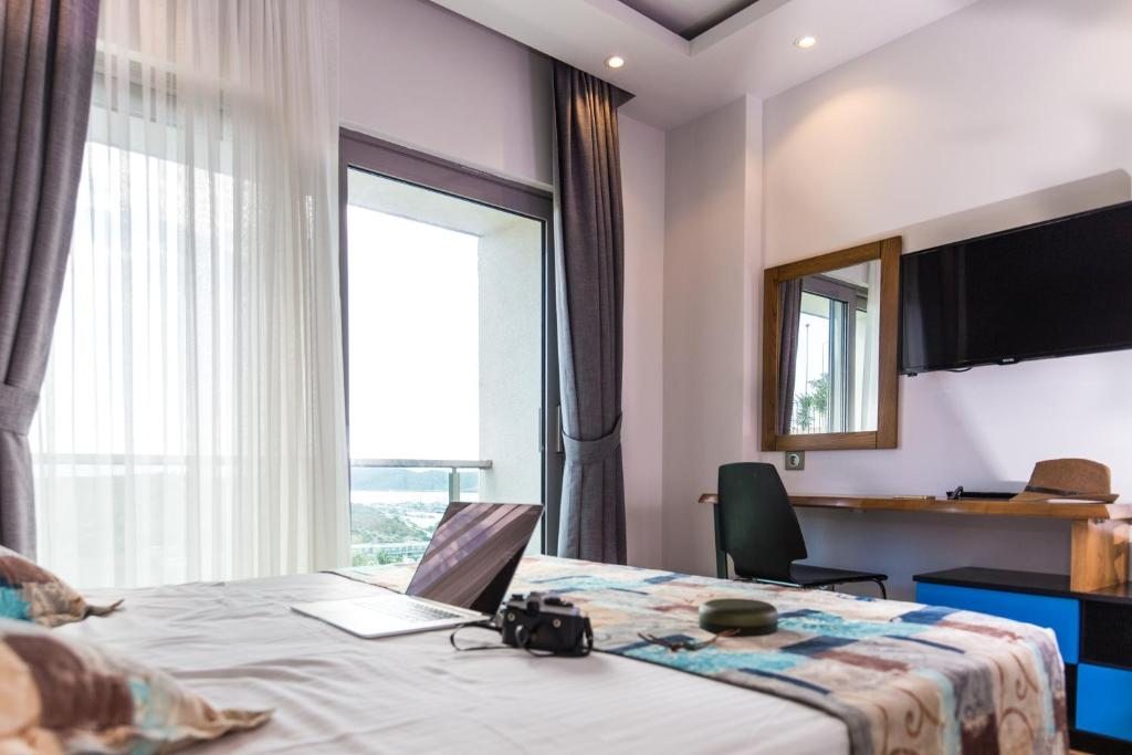 Двухместный (Двухместный номер Делюкс с 1 кроватью и видом на море) апарт-отеля Degirmenburnu Residence, Бодрум