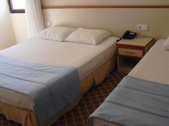 Двухместный (Стандартный двухместный номер с 1 кроватью или 2 отдельными кроватями, вид на море) отеля Kerman Hotel, Чешме
