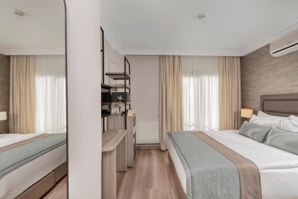 Двухместный (Стандартный двухместный номер с 1 кроватью или 2 отдельными кроватями и видом на сад) курортного отеля Piril Hotel, Чешме